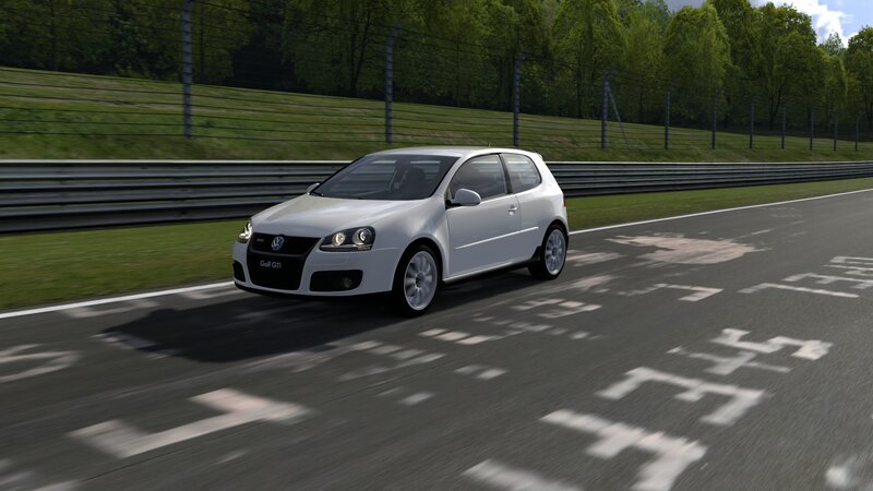 White Golf GTI on racetrack