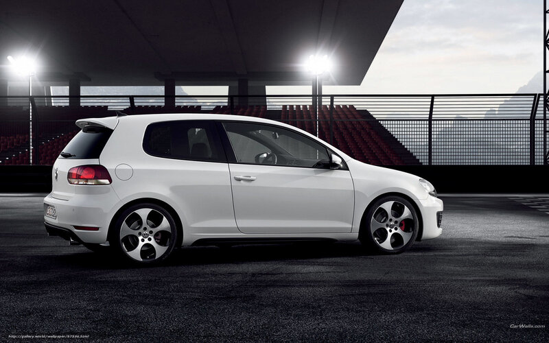 white golf hatchback on track