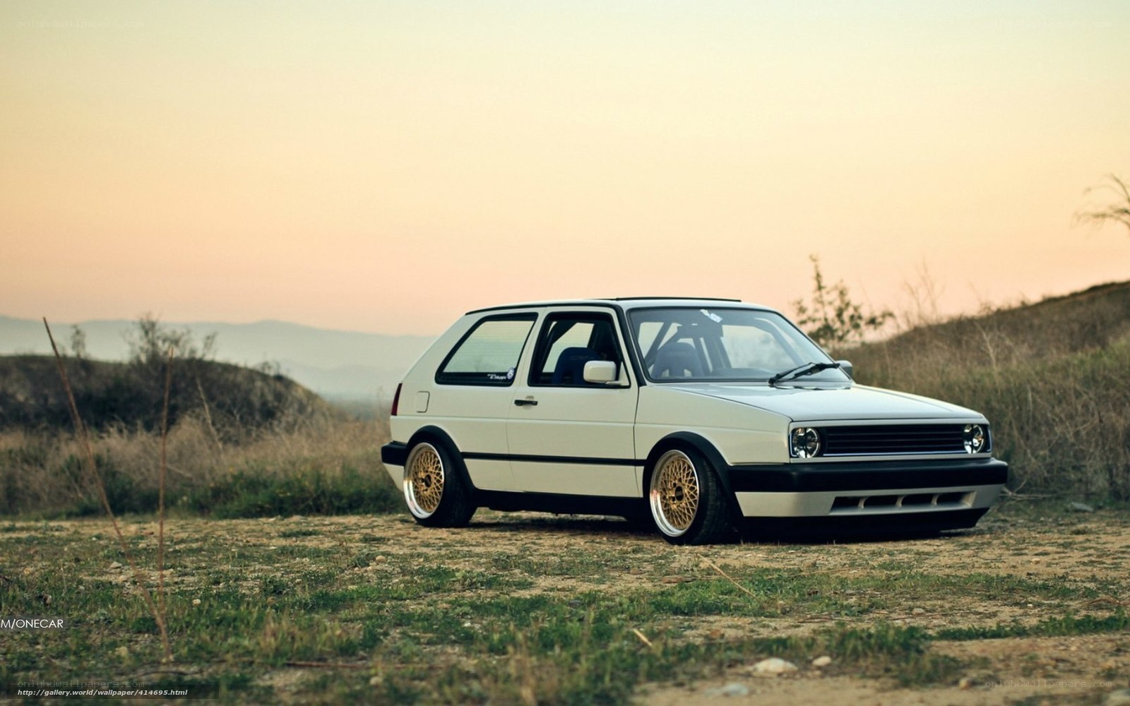 white golf mk2 at sunset