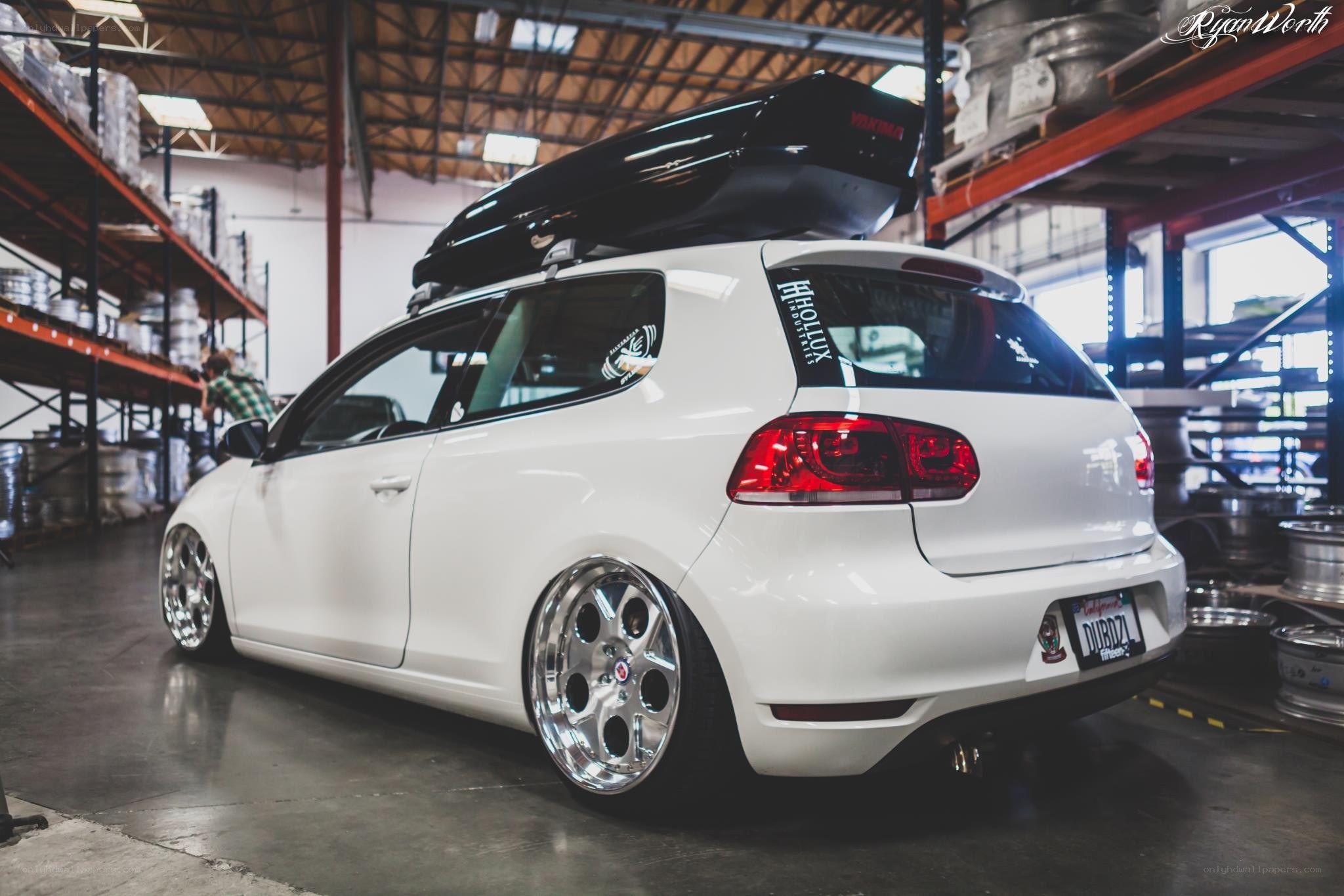White Golf with roof box