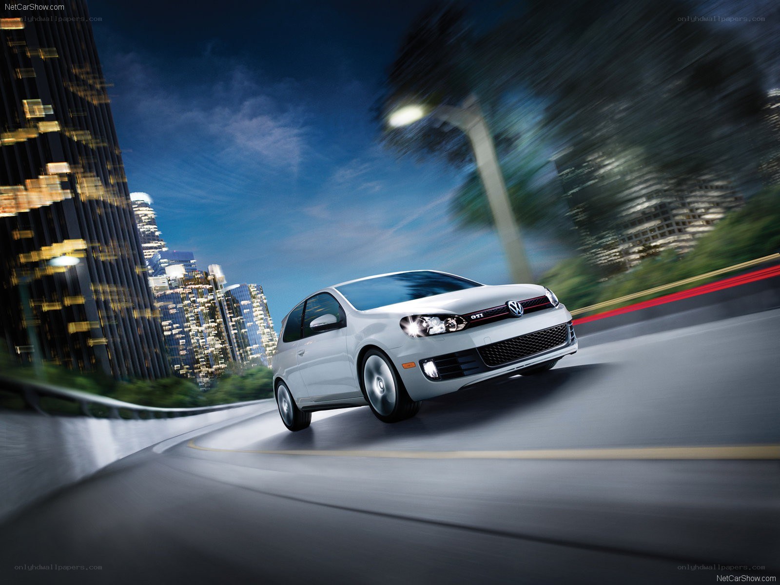 White GTI driving at night
