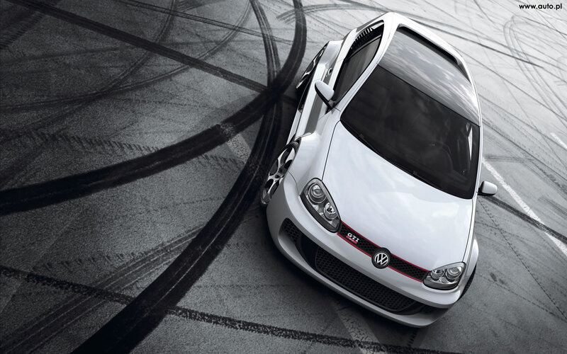 White GTI on racetrack