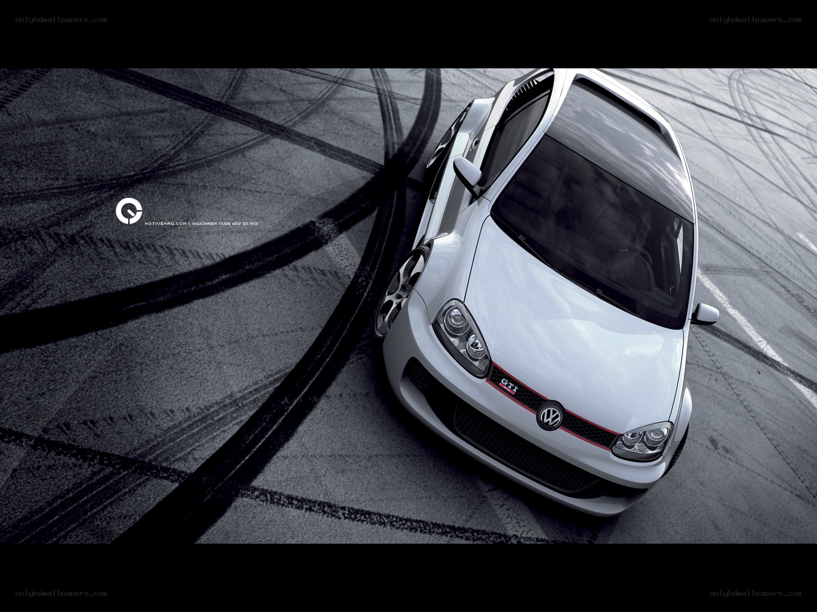 White GTI on racetrack