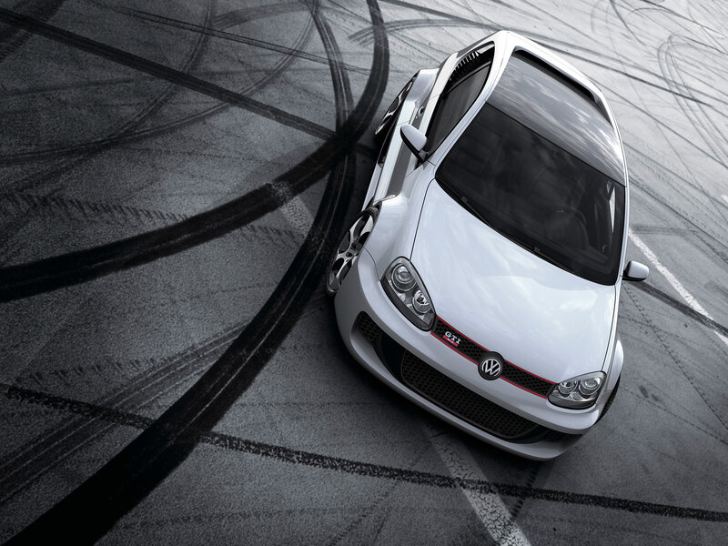 White GTI on racetrack