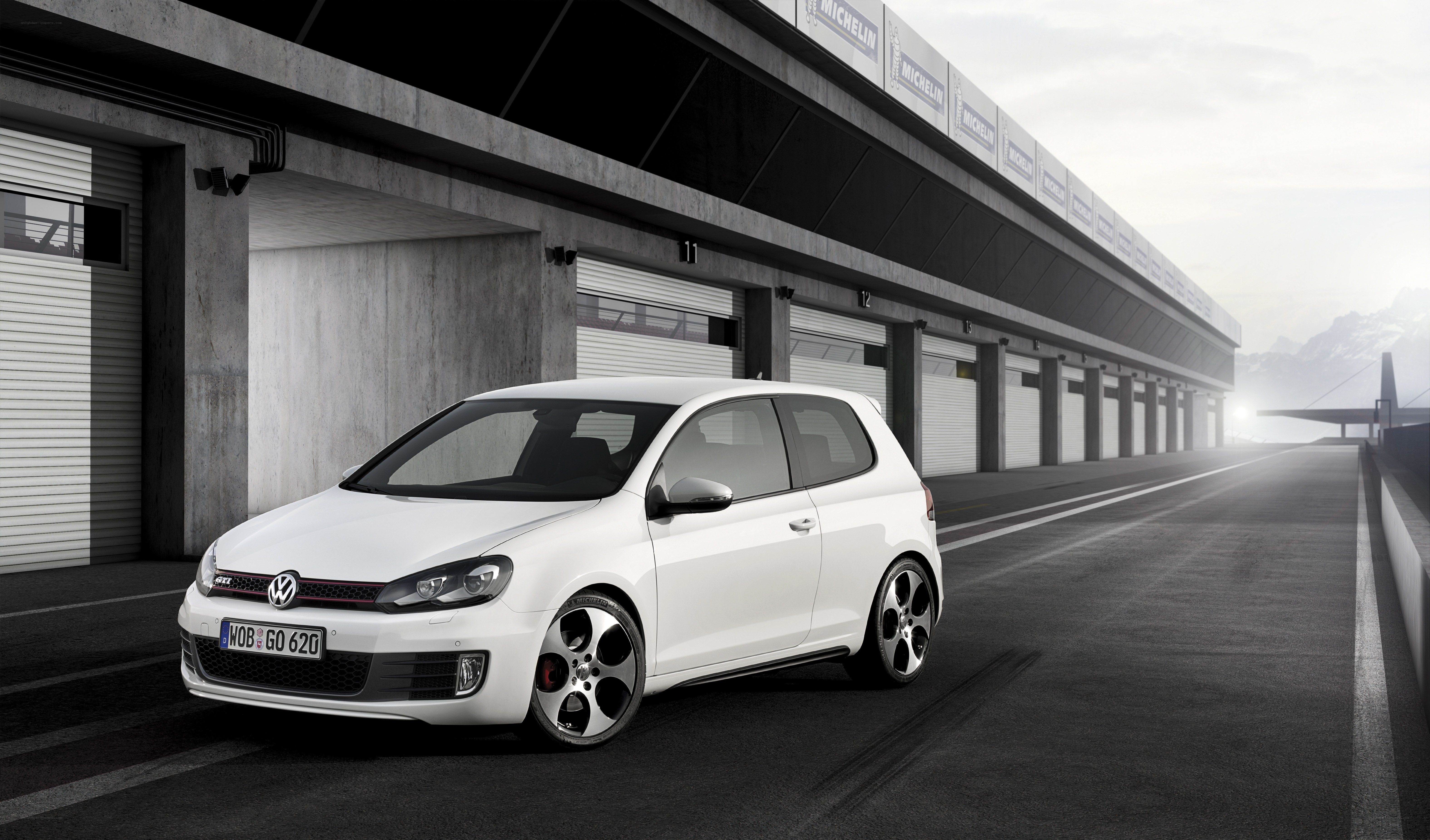 White GTI on racetrack
