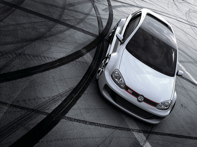 White GTI on racetrack