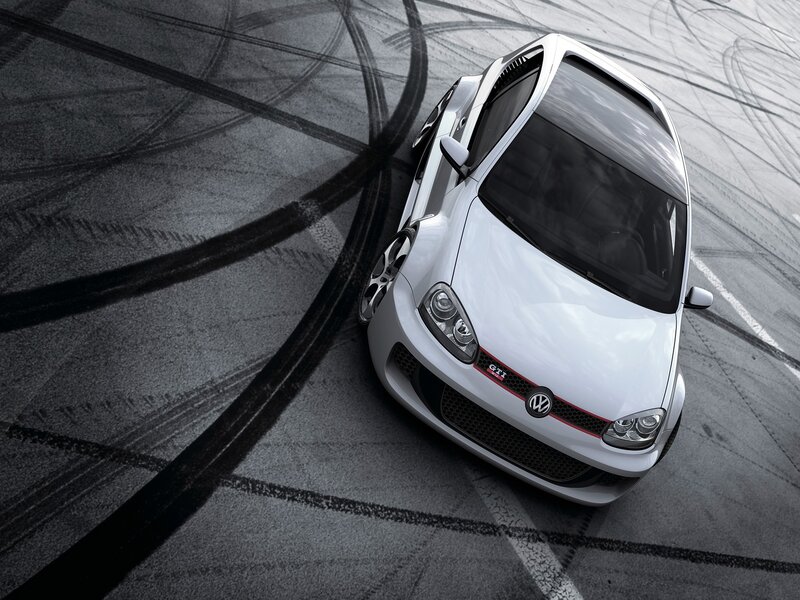 White GTI on racetrack