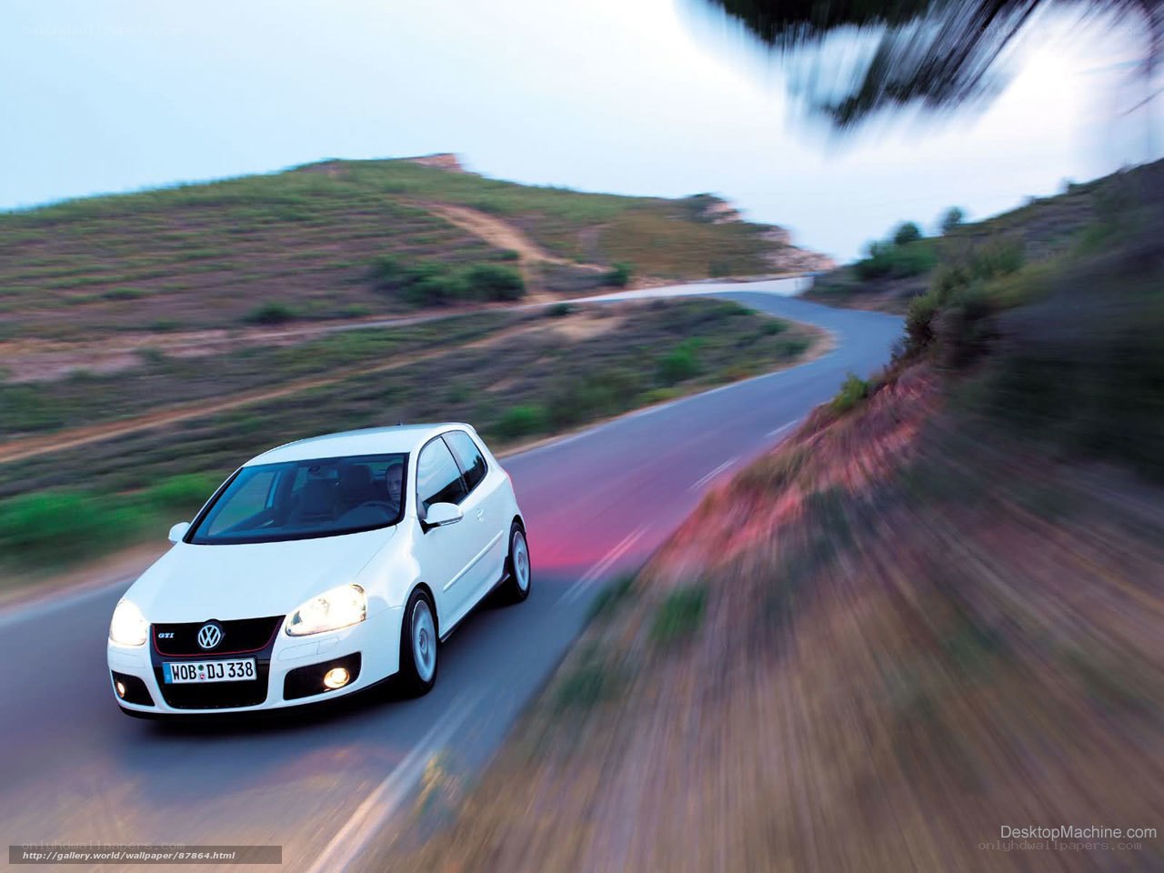 White GTI on winding road