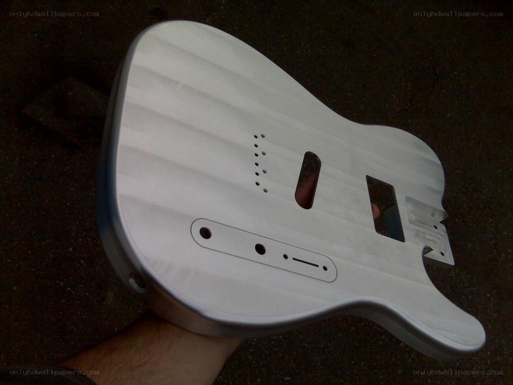 white guitar body