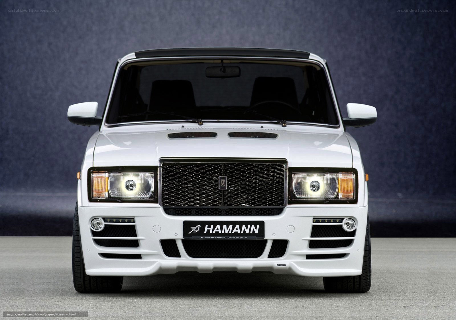 white hamann suv front view