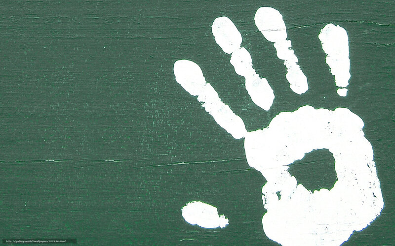 white handprint on green surface