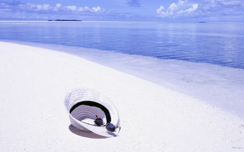 White Hat on Beach