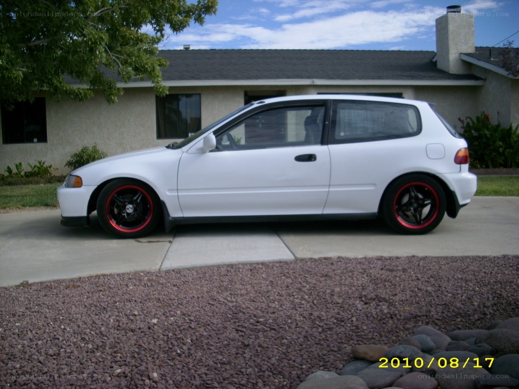 white hatchback car