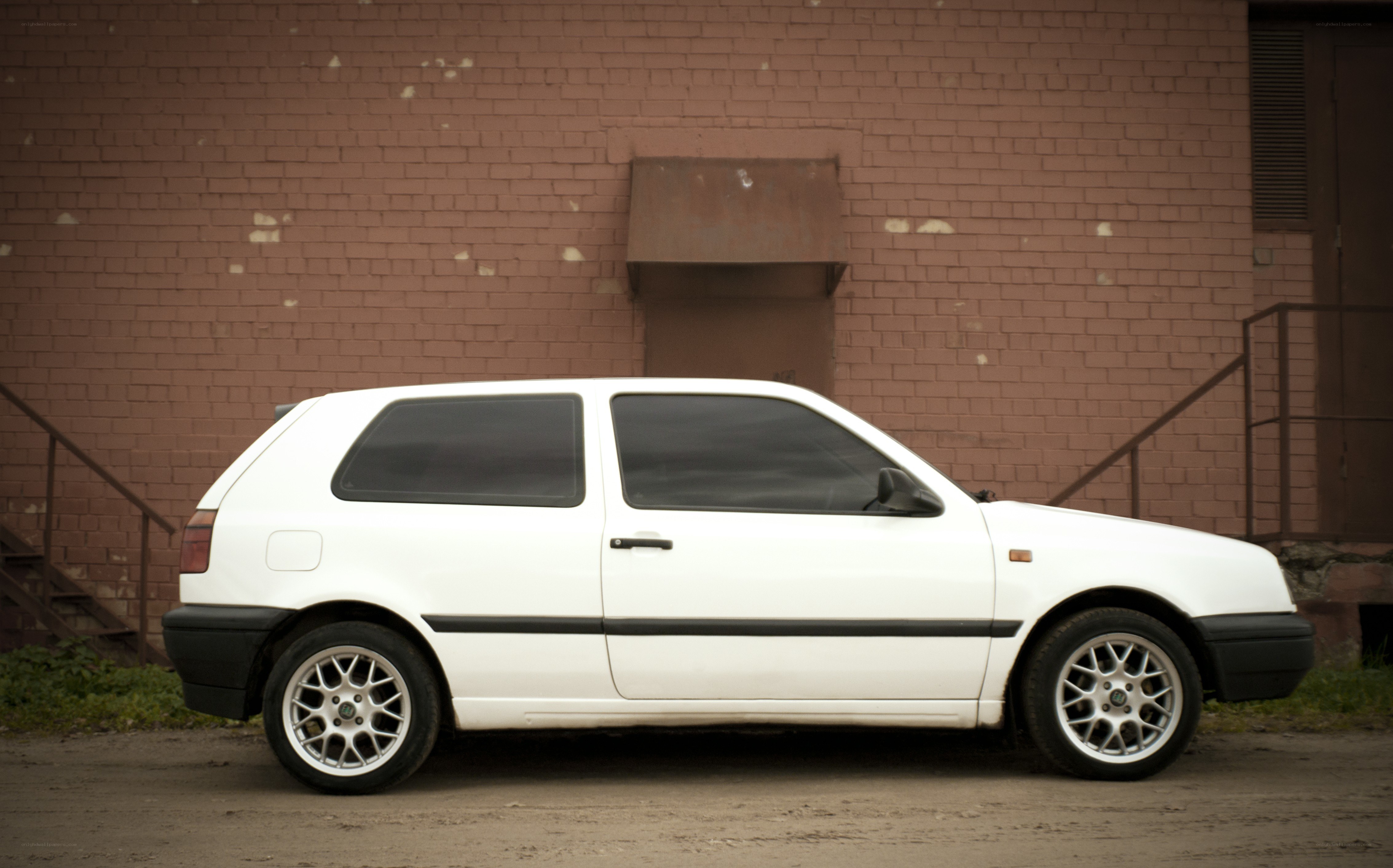 white hatchback car