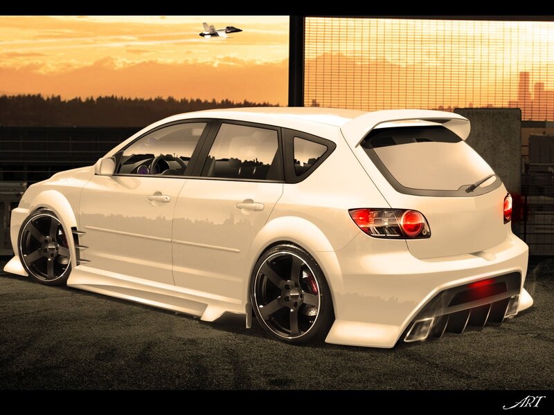 white hatchback car at sunset