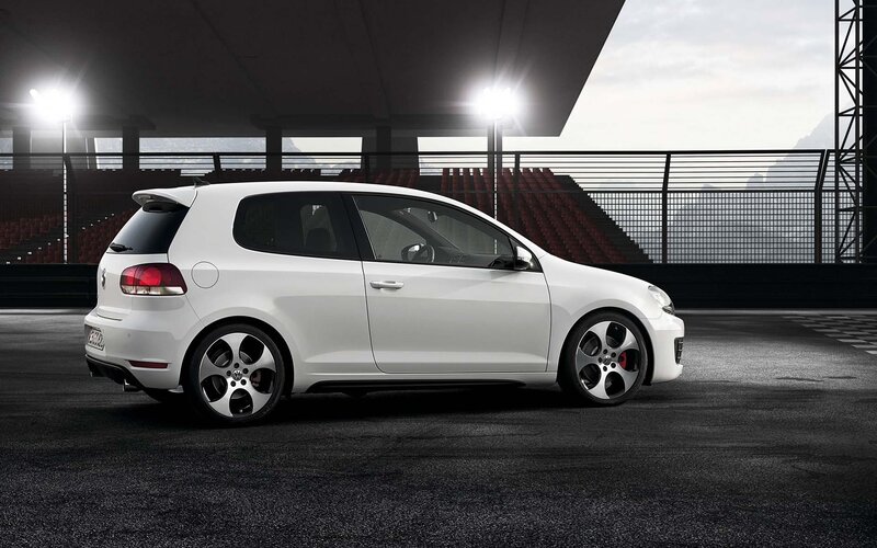 White Hatchback Car — Dramatic, Photograph, Race Track, Stadium Seats