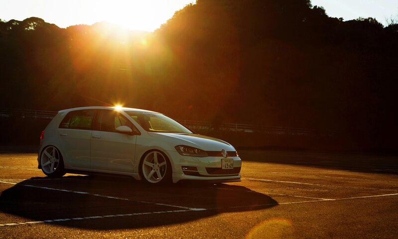 White Hatchback Car — Dramatic, Sunset, Photograph