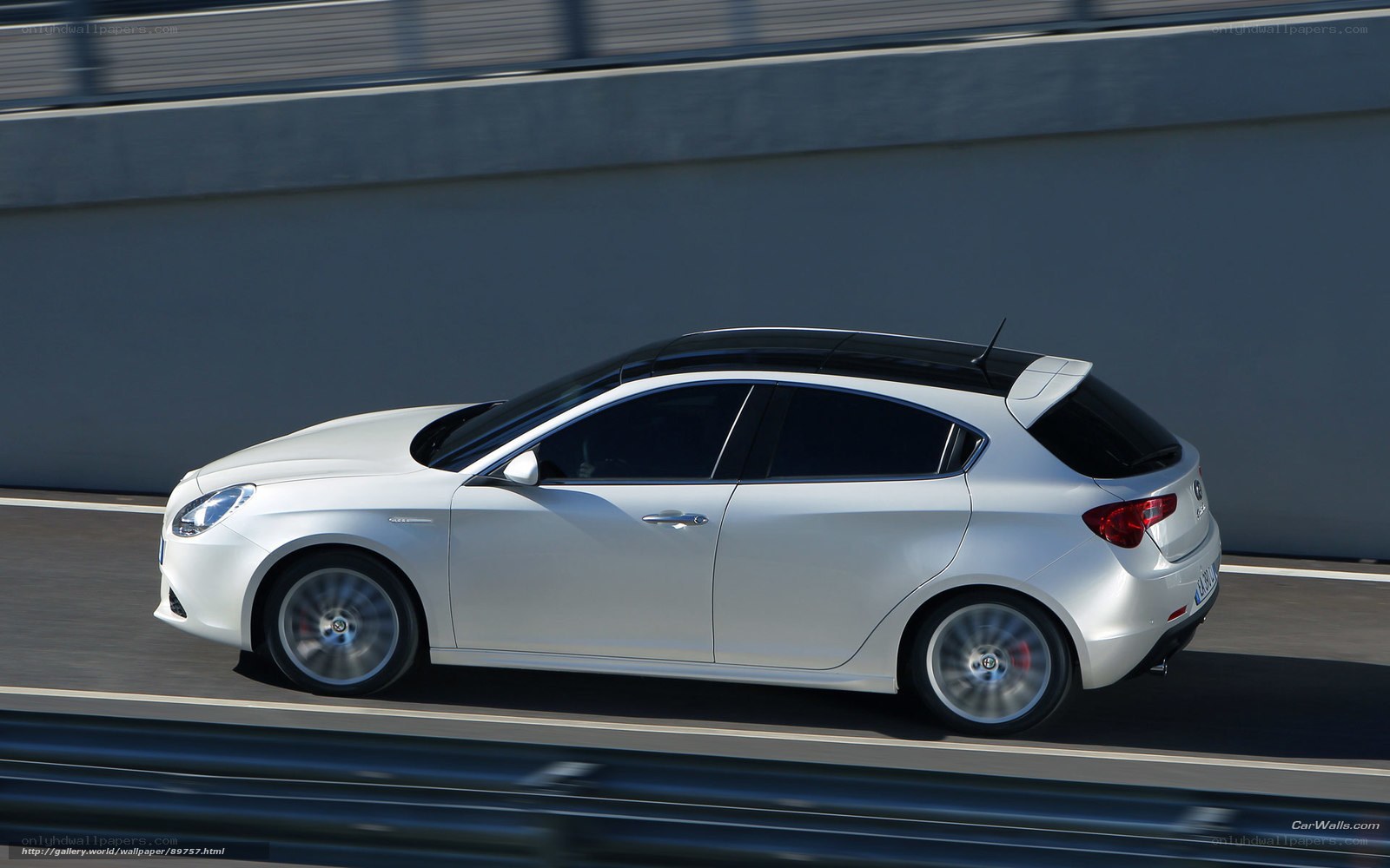 white hatchback car in motion