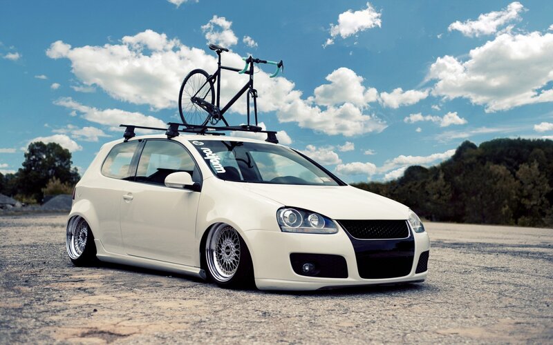 White Hatchback Car — Serene