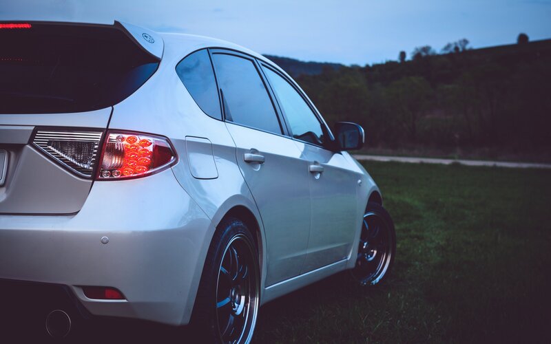 White Hatchback Car — Silver
