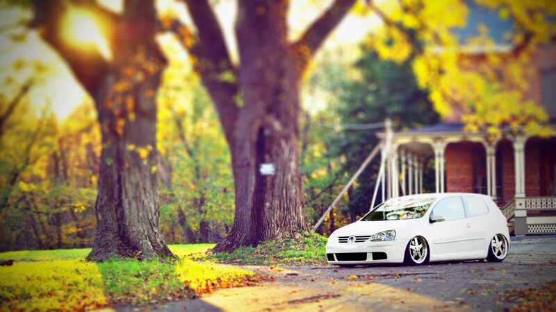White Hatchback Car — Yellow