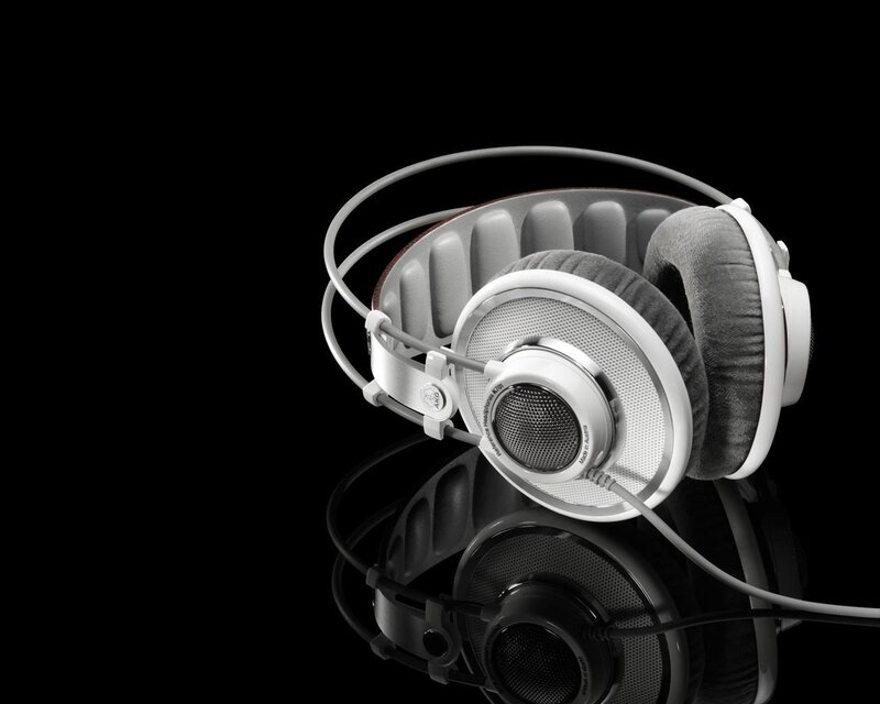 white headphones on black background