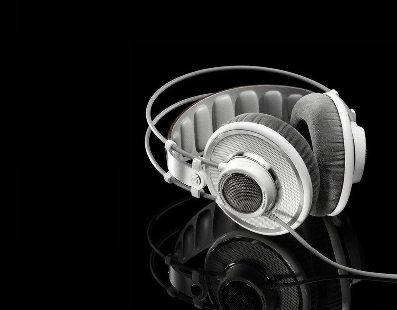 white headphones on black background