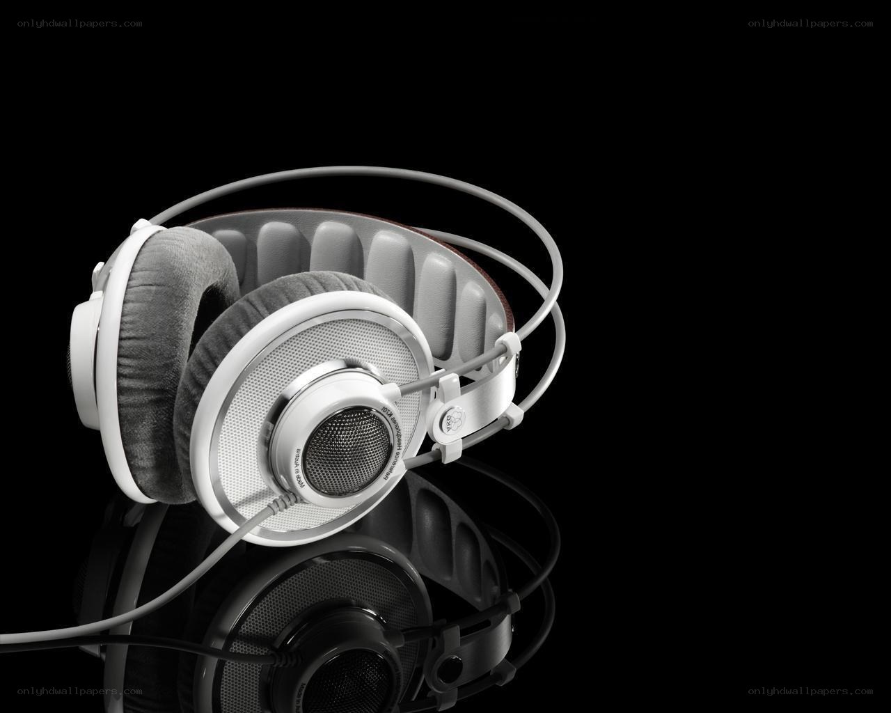 white headphones on black background