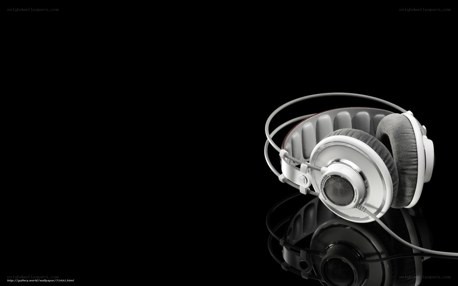 white headphones on black background