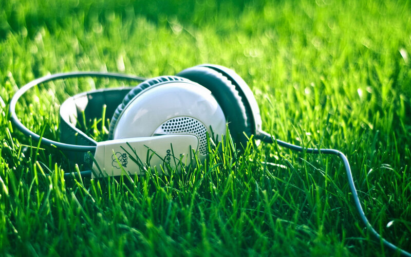 White Headphones on Grass