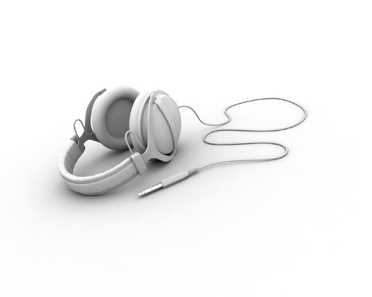 white headphones on white surface