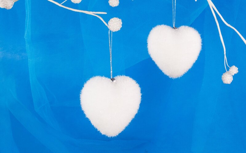 white heart ornaments on blue