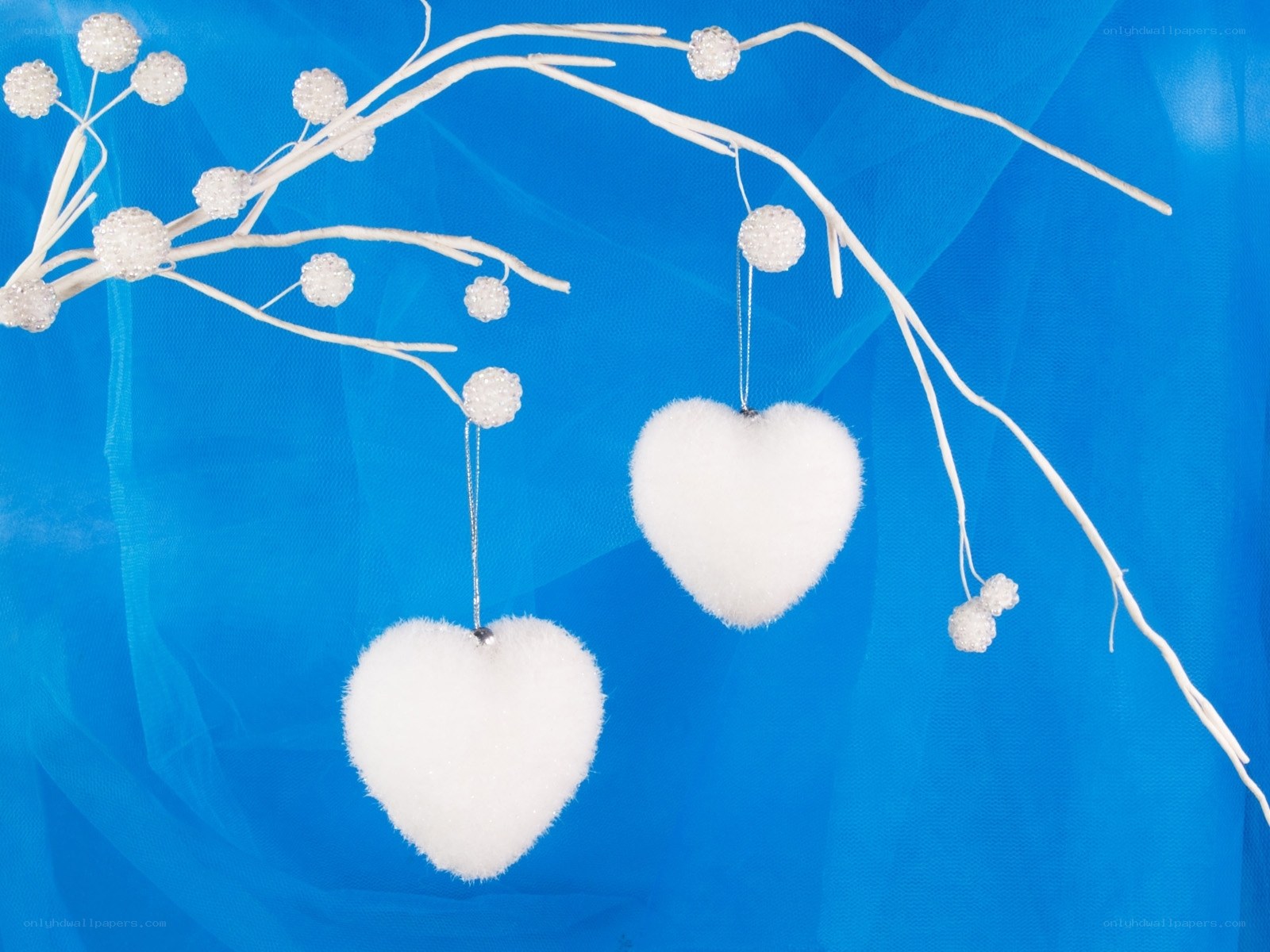 White hearts on blue background
