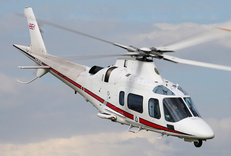 White Helicopter in Flight — Dynamic, Afternoon