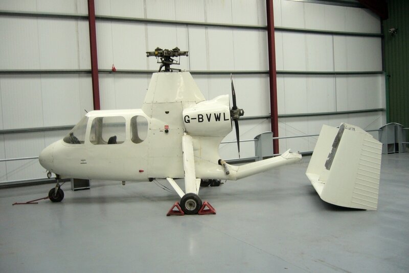 White helicopter in hangar
