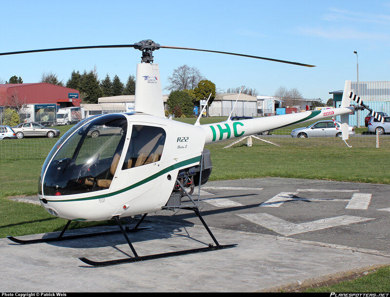 White Helicopter on Tarmac — Calm, Afternoon
