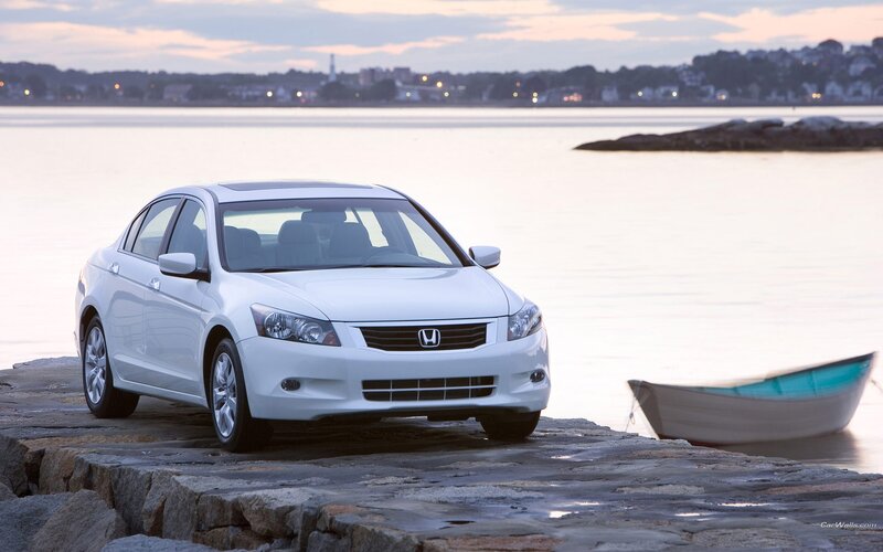 White Honda Accord by the water
