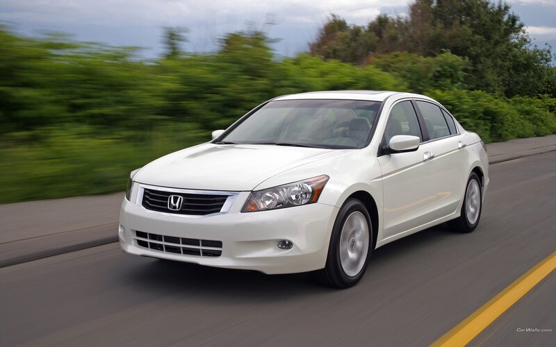 white honda accord driving on road