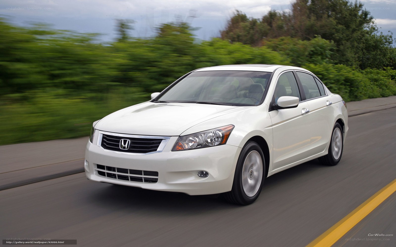 White Honda Accord in motion