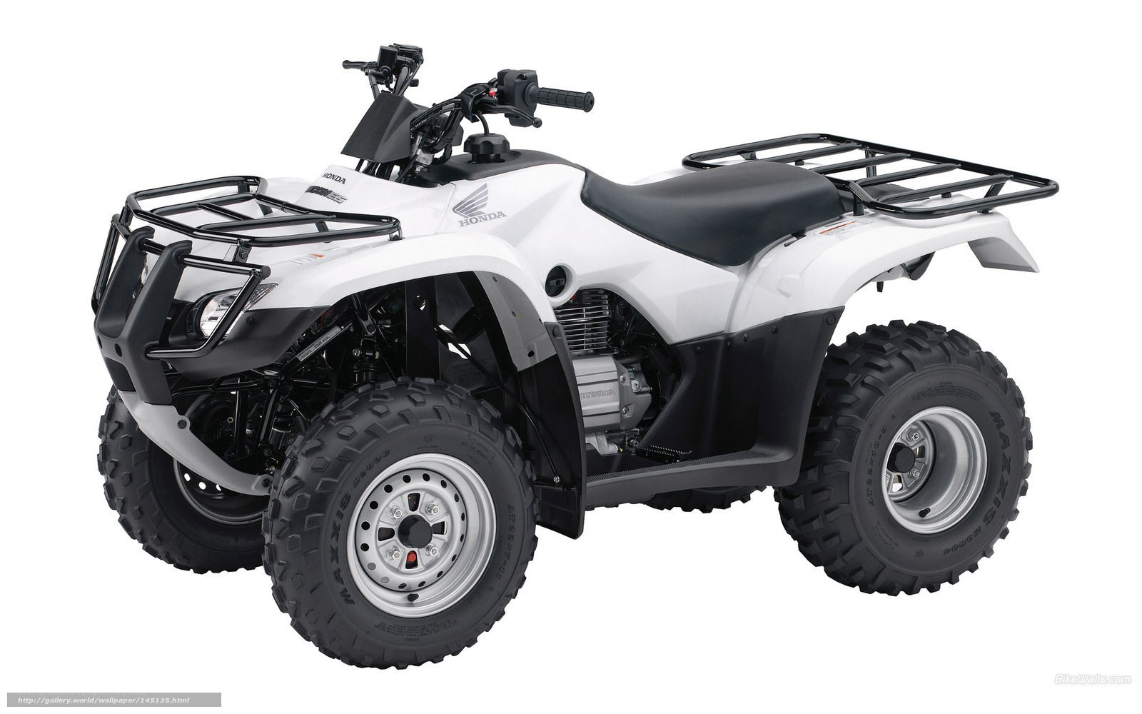 White Honda ATV with racks