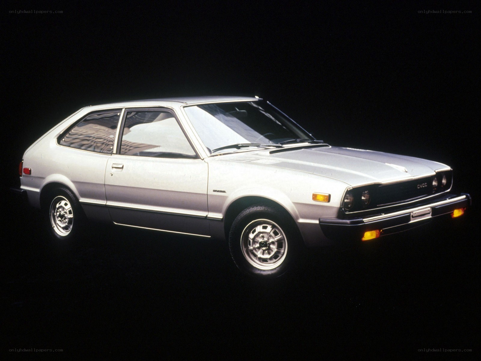 White Honda Civic hatchback