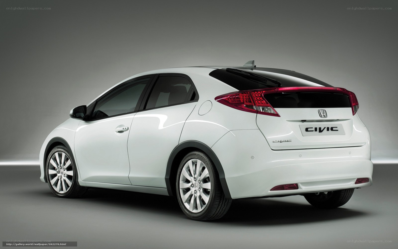White Honda Civic hatchback