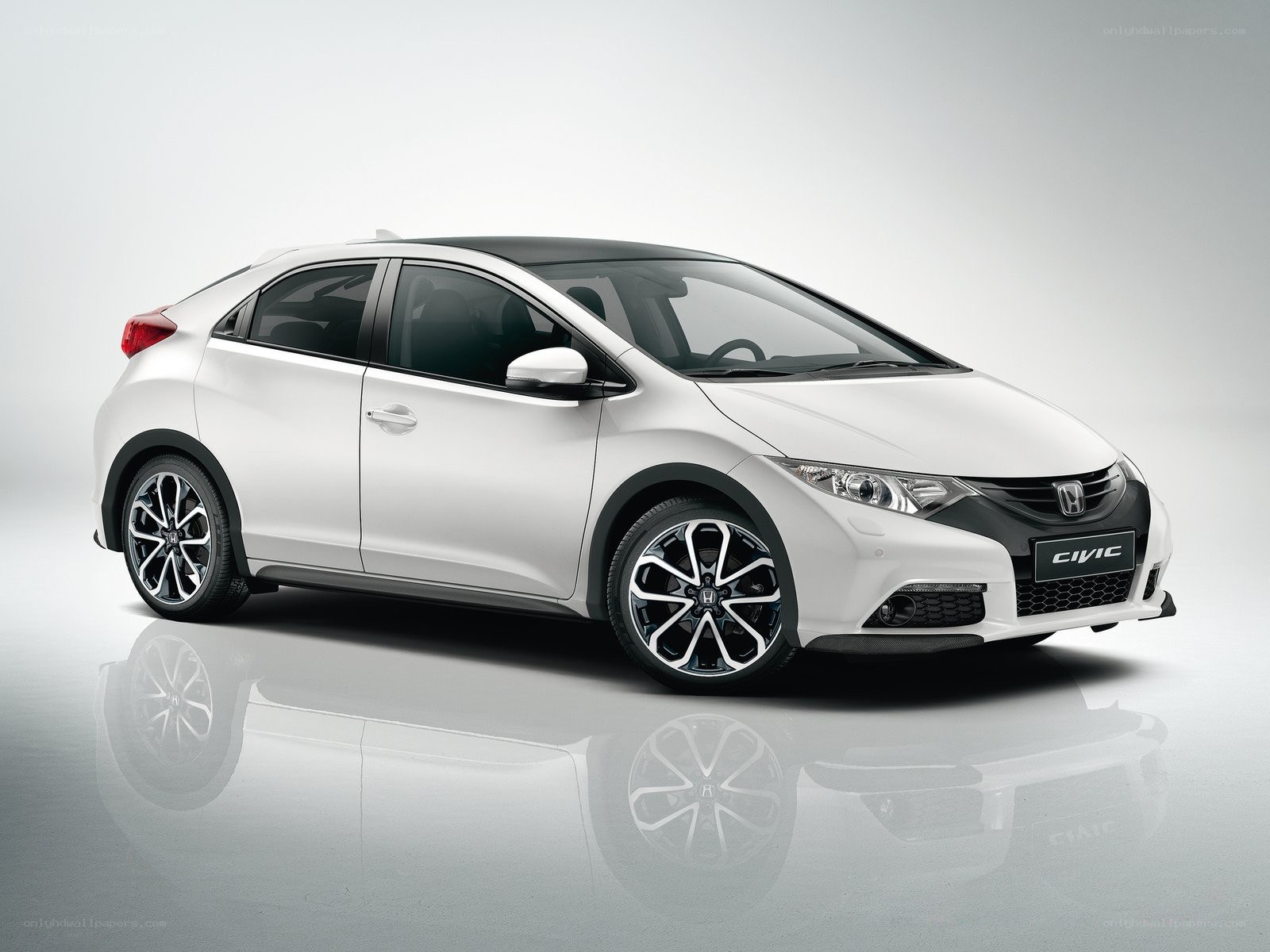White Honda Civic hatchback