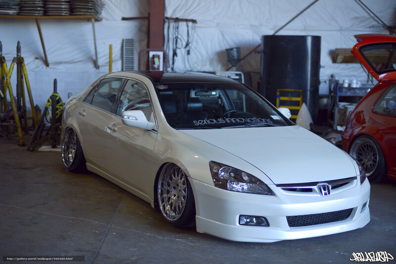 white honda civic in garage
