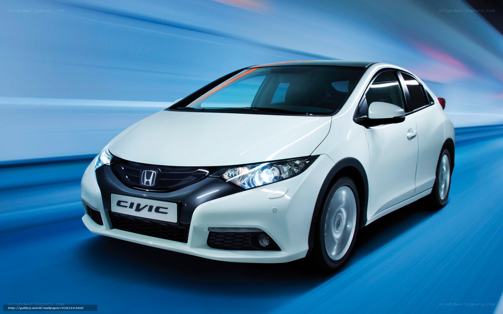 White Honda Civic in motion