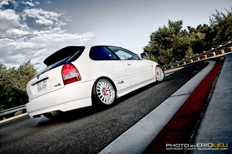 white honda civic on winding road