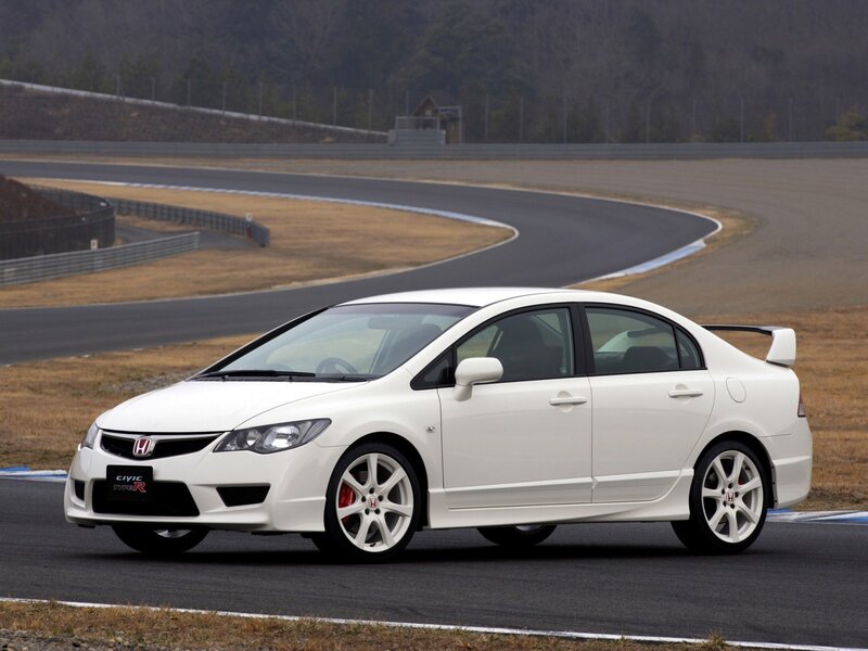 White Honda Civic Type R on racetrack