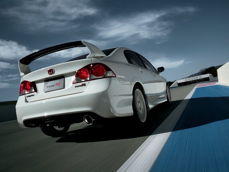White Honda Civic Type R on racetrack