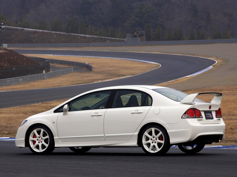 White Honda Civic Type R on racetrack