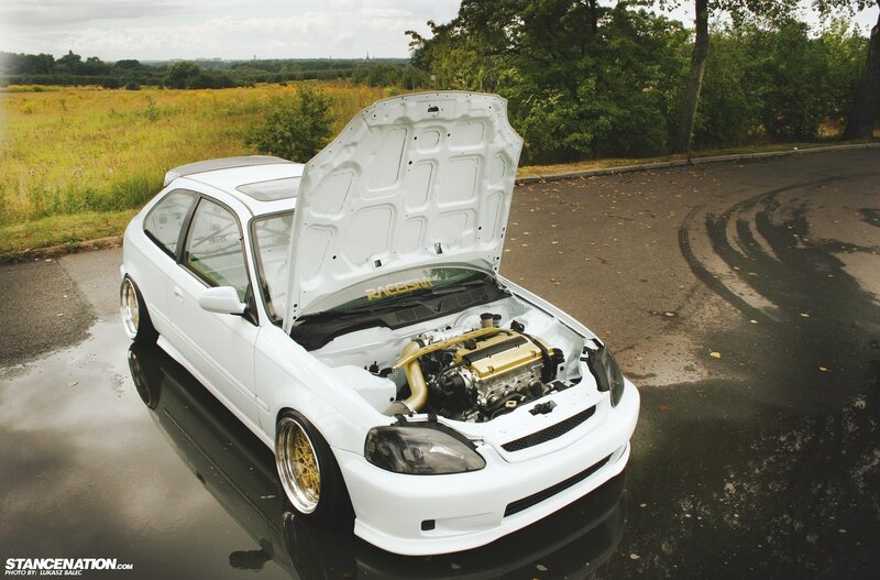 white honda civic with open hood